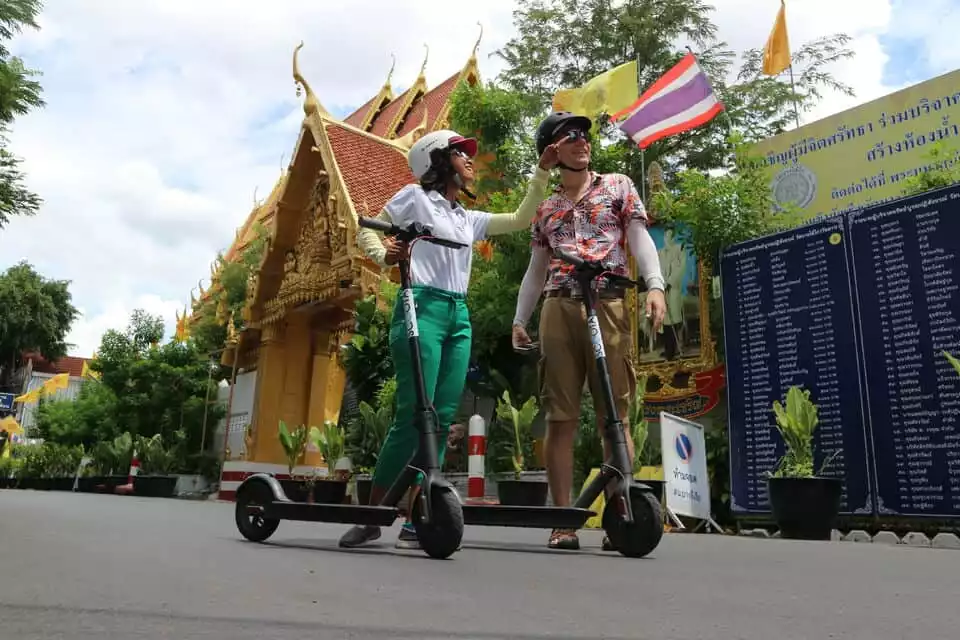 Bangkok: E-Scooter, Local Sights, and Street Food Tour | GetYourGuide