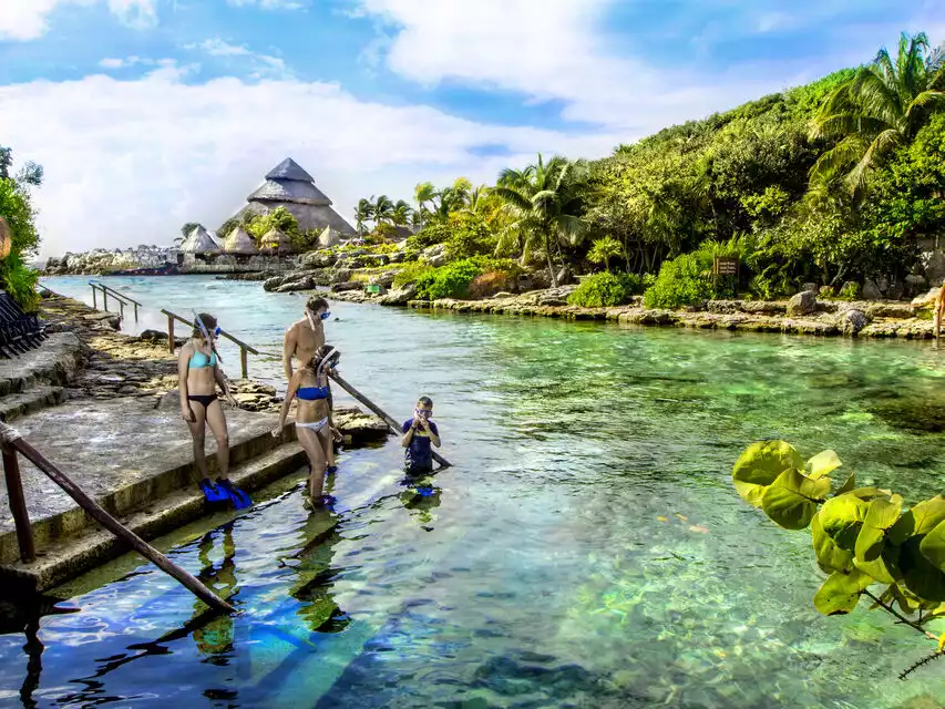 From Cancun: Xcaret Park with Night Show and Transportation | GetYourGuide