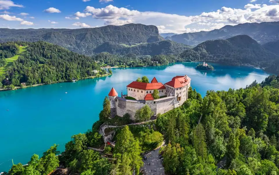 From Ljubljana: Postojna Cave & Lake Bled Trip with Tickets | GetYourGuide