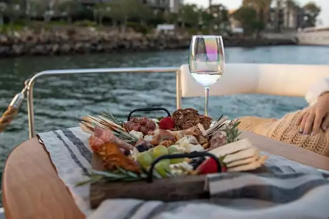 Luxury Electric Boat Cruise with Wine, Charcuterie Board & Sea Lions Spotting