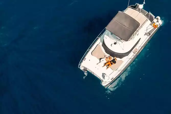 Private Caldera Cruise with Power Catamaran ENJOY incl. Meal & Drinks