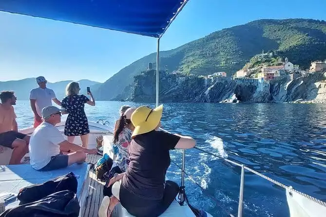 Sunset Cinque Terre Boat Tour with a traditional ligurian gozzo from Monterosso